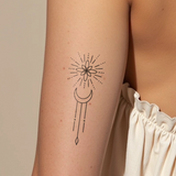 Geometric moon ornament tattoo