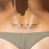 butterfly tramp stamp tattoo