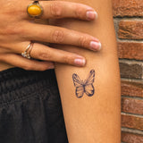 Feiner Schmetterling Tattoo