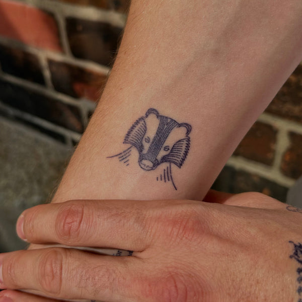 Harry Potter Haus Hufflepuff Dachs Tattoo