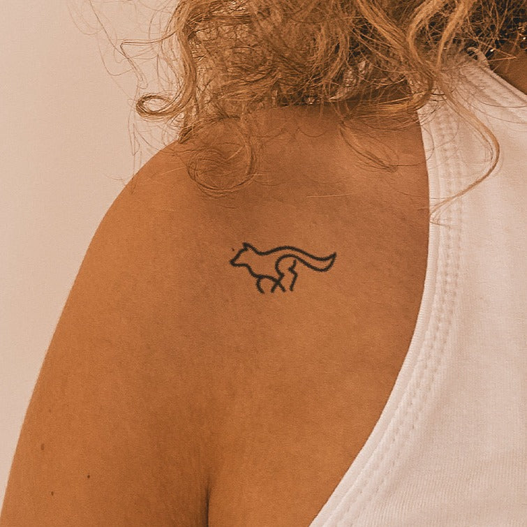 Laufender Wolf Tattoo
