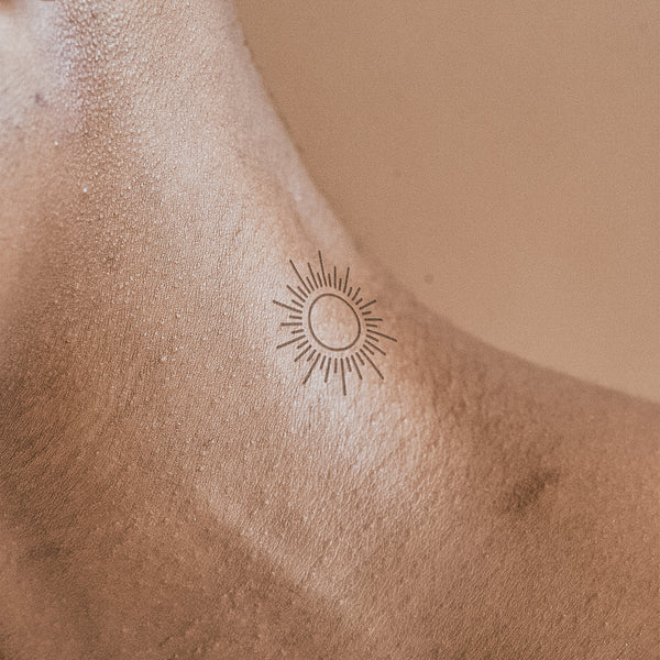 Linien-Sonne Tattoo