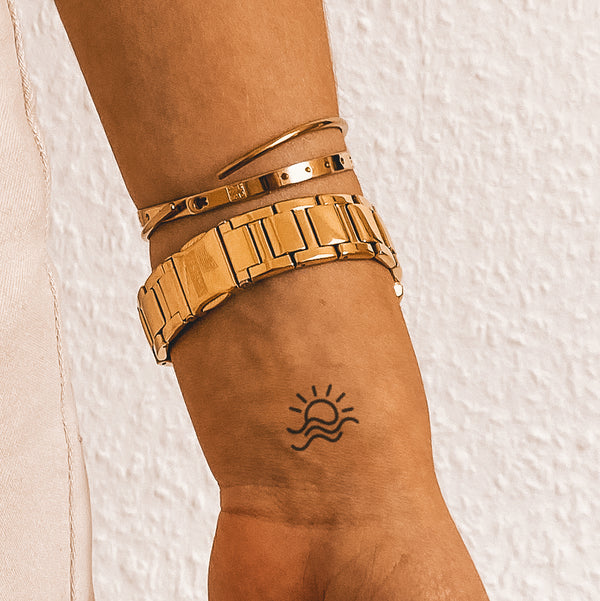 Sonne mit 3 Wellen Tattoo