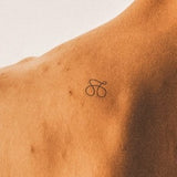 Ein-Linien-Bike Tattoo