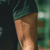 TIny Symmetrical Mountains 2-Week-Tattoo Inkster