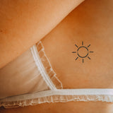Sonnenlicht Tattoo